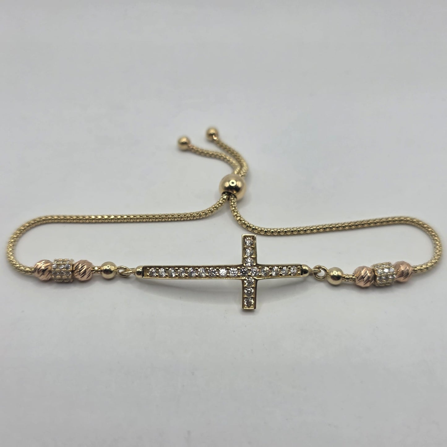 CROSS BRACELET 10K